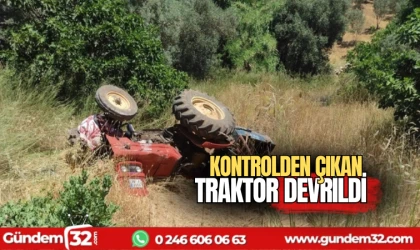 Kontrolden çıkan traktör devrildi