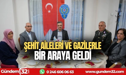 Şehit aileleri ve gazilerle bir araya geldi