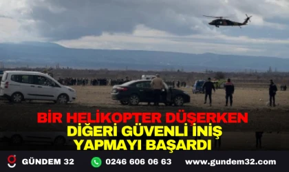 BİR HELİKOPTER DÜŞERKEN DİĞERİ GÜVENLİ İNİŞ YAPMAYI BAŞARDI